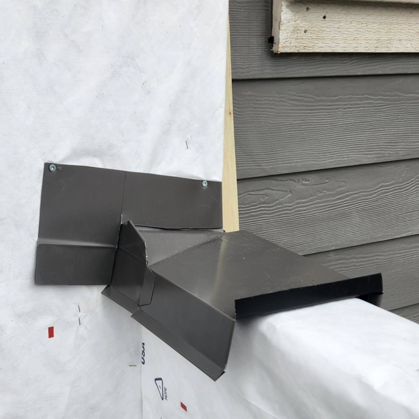 Custom bent metal work for valley flashing in Agassiz BC